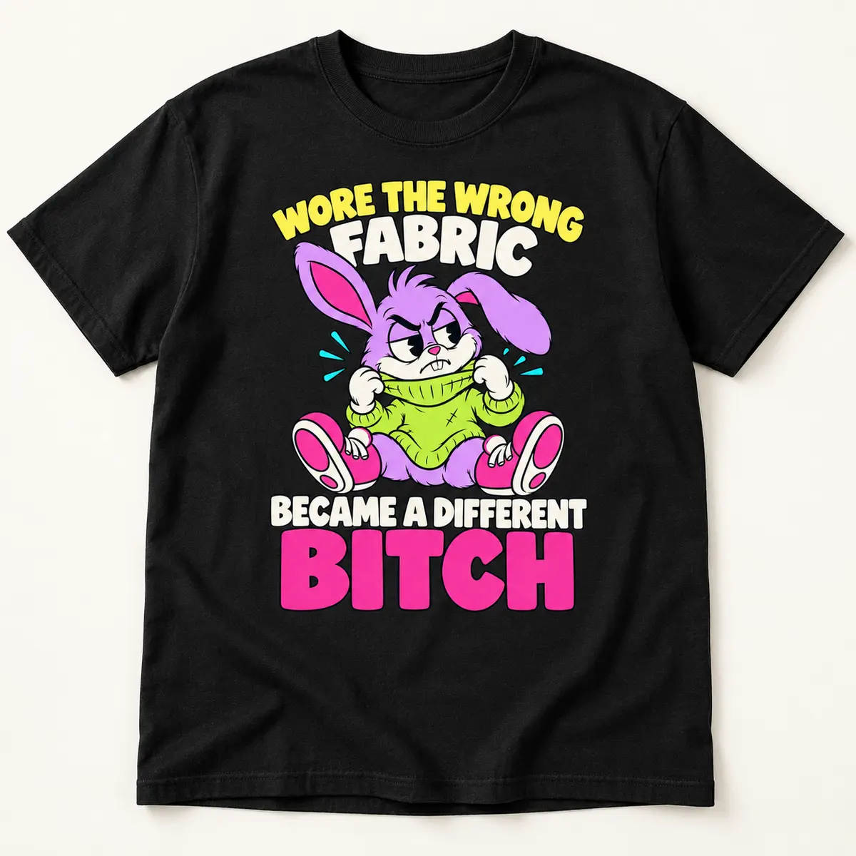 Black t-shirt featuring the Little Liabilities Wrong Fabric cartoon design: WORE THE WRONG FABRIC; BECAME A DIFFERENT; BITCH