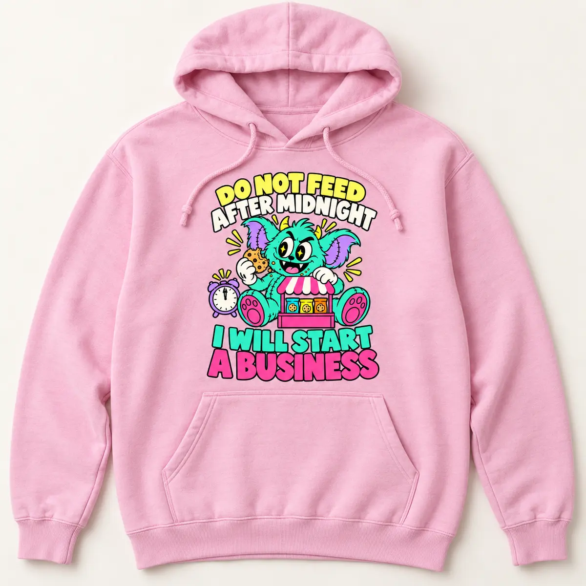Pink hoodie with a mint monster and the slogan: Do not feed after midnight. I will start a business.