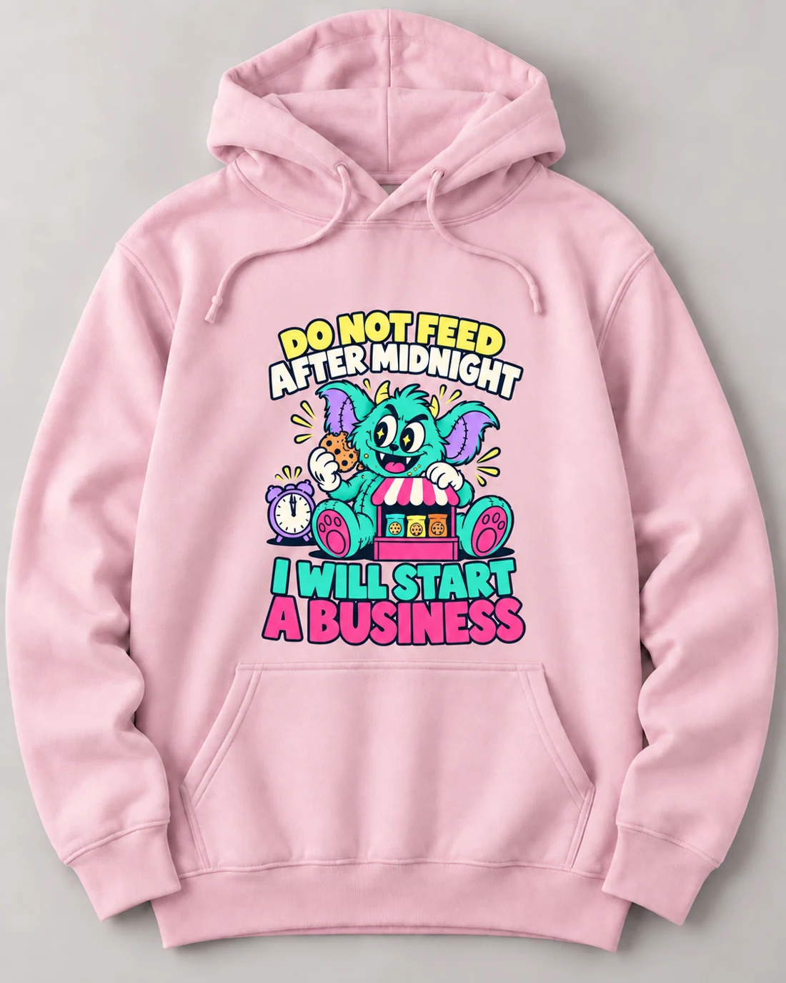 Pink hoodie with a mint monster and the slogan: Do not feed after midnight. I will start a business.